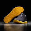 Black Heather Yellow Trainer